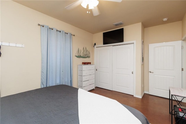 bedroom featuring a ceiling fan and visible vents