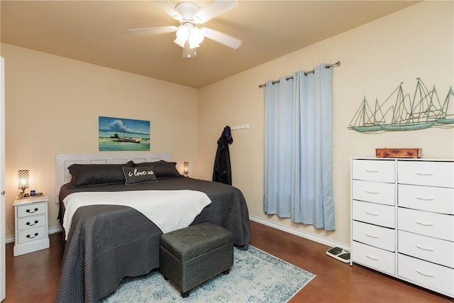 bedroom featuring a ceiling fan and baseboards