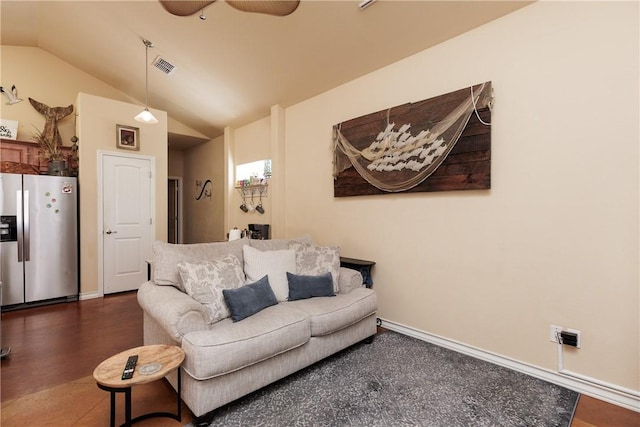 living room with lofted ceiling, visible vents, dark wood-type flooring, ceiling fan, and baseboards