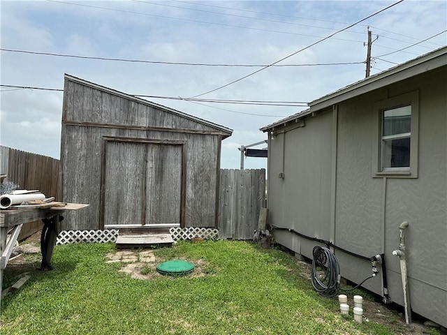 230 Lola Johnson, Corpus Christi, TX 78418 - view of yard featuring an outdoor structure, a shed, and fence