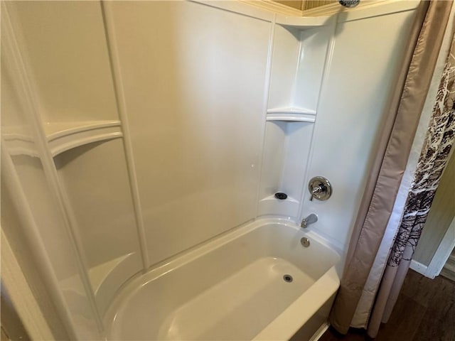 230 Lola Johnson, Corpus Christi, TX 78418 - full bath featuring shower / bath combo with shower curtain and wood finished floors