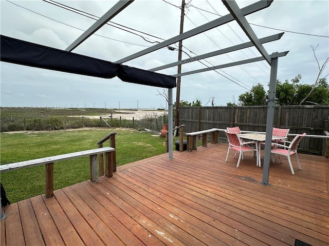 230 Lola Johnson, Corpus Christi, TX 78418 - deck featuring a yard, outdoor dining area, and a fenced backyard