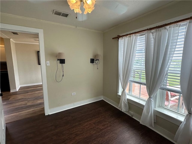 230 Lola Johnson, Corpus Christi, TX 78418 - unfurnished dining area with dark wood finished floors, visible vents, and baseboards