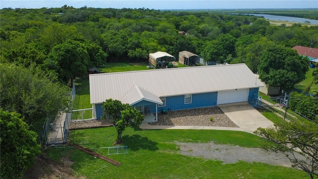 4625 Harney Rd, Corpus Christi, TX 78410 - aerial view of property and surrounding area with a heavily wooded area