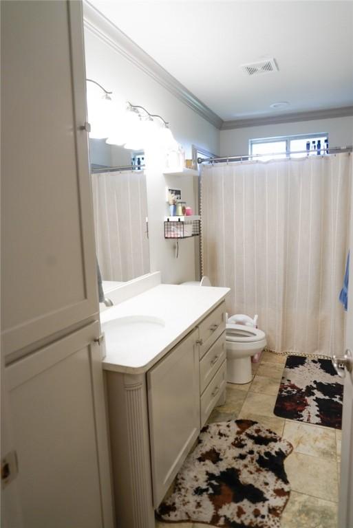 4625 Harney Rd, Corpus Christi, TX 78410 - full bathroom featuring vanity, ornamental molding, and curtained shower