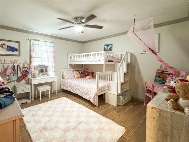4625 Harney Rd, Corpus Christi, TX 78410 - bedroom with crown molding, wood finish floors, and a ceiling fan