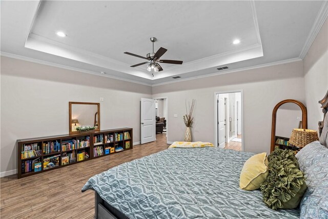 4133 Midlands St, Corpus Christi, TX 78414 - bedroom featuring a raised ceiling, wood finished floors, crown molding, recessed lighting, and ceiling fan