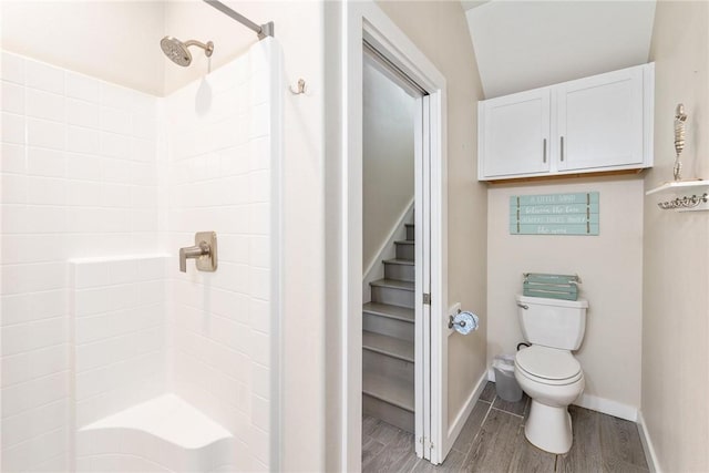 bathroom featuring toilet and a shower