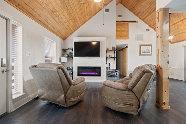 living room featuring plenty of natural light, a barn door, wood ceiling, and dark hardwood / wood-style flooring