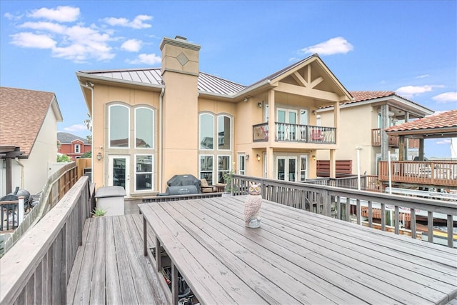 wooden terrace with grilling area