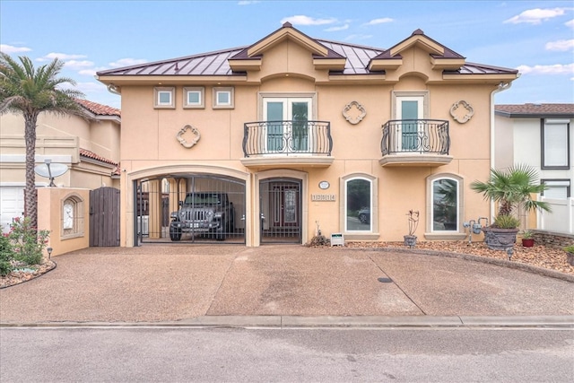 view of front of home featuring a balcony