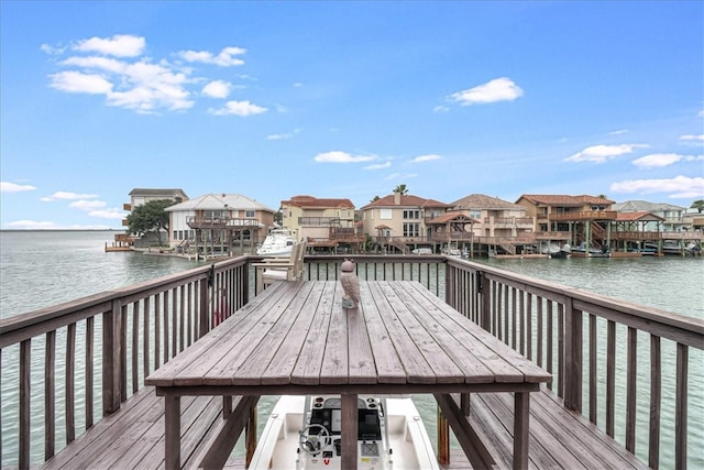 dock area featuring a water view and a gazebo