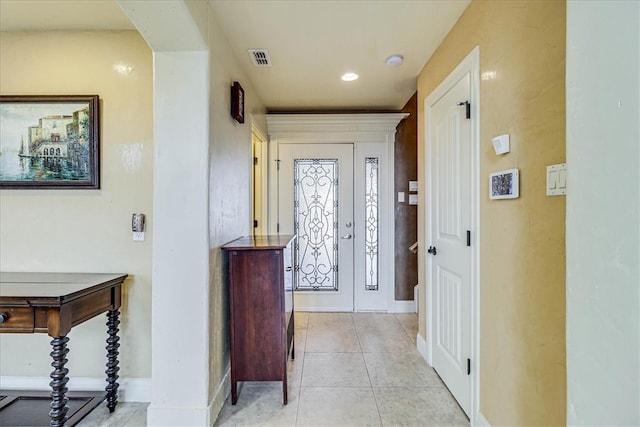 entrance foyer with light tile patterned floors