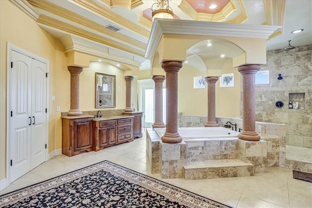 bathroom with tile patterned flooring, crown molding, and decorative columns