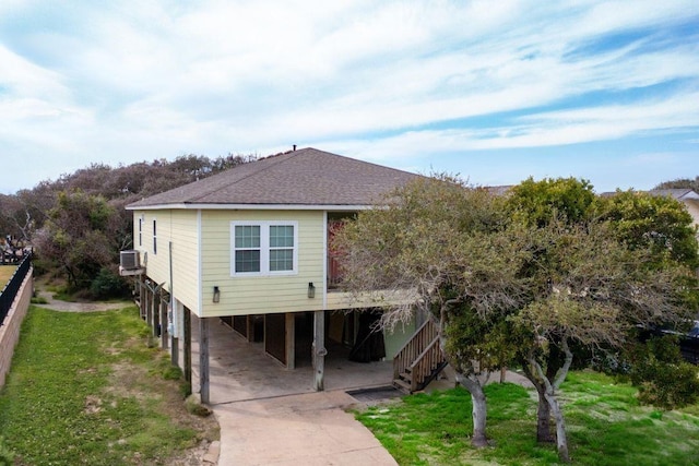 view of front of property with a carport