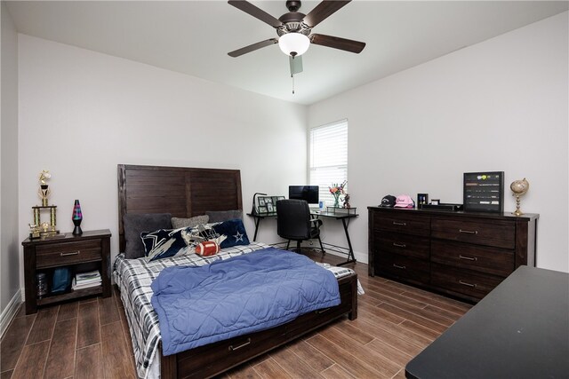 bedroom featuring dark hardwood / wood-style floors and ceiling fan