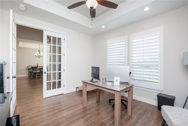 office area featuring french doors, ceiling fan with notable chandelier, hardwood / wood-style flooring, and crown molding