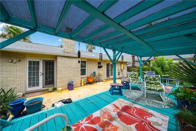 15718 Escapade St, Corpus Christi, TX 78418 - view of patio with french doors and a deck