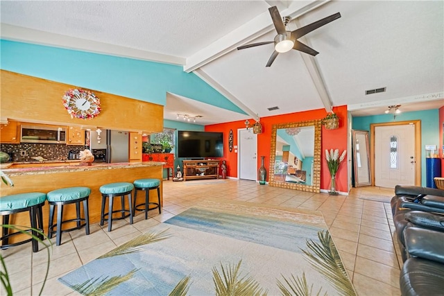 15718 Escapade St, Corpus Christi, TX 78418 - living area with light tile patterned floors and a ceiling fan