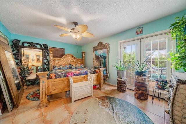 15718 Escapade St, Corpus Christi, TX 78418 - bedroom featuring a textured ceiling, light tile patterned floors, and ceiling fan