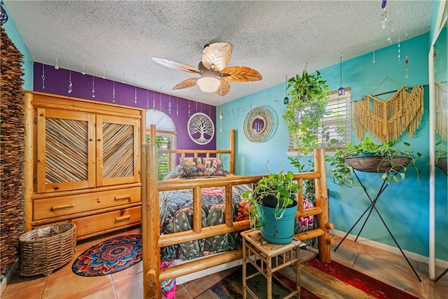 15718 Escapade St, Corpus Christi, TX 78418 - sitting room with a textured ceiling, ceiling fan, and tile patterned flooring