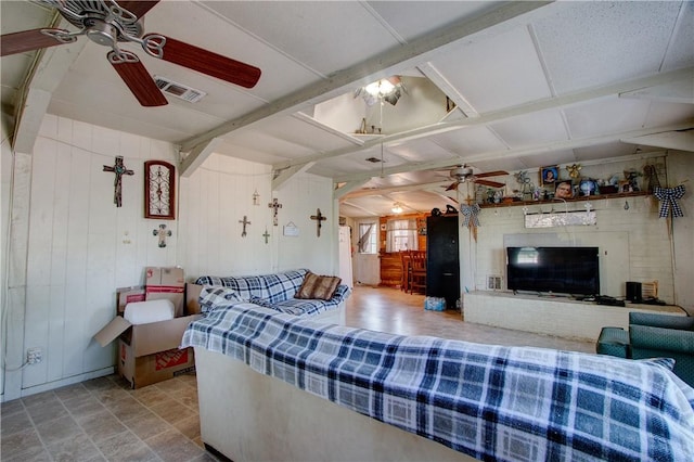 1162 N Sh 95, Bastrop, TX 78602 - living room featuring ceiling fan and wooden walls