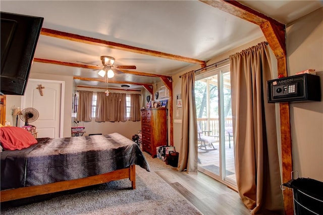 1162 N Sh 95, Bastrop, TX 78602 - bedroom featuring access to outside and light wood-style flooring