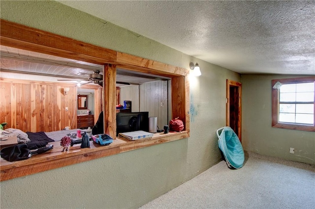1162 N Sh 95, Bastrop, TX 78602 - welcome area featuring a textured wall, a ceiling fan, and a textured ceiling