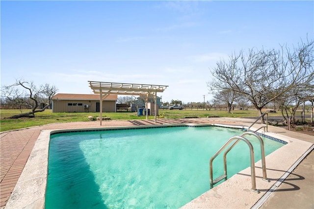 pool featuring a lawn, an outdoor structure, and a pergola