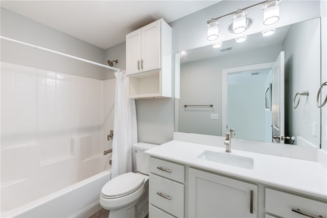 full bathroom with vanity, toilet, and shower / tub combo