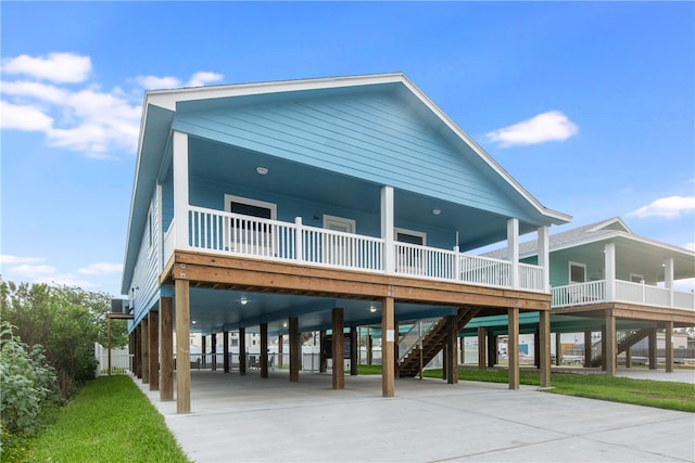 back of property featuring a carport