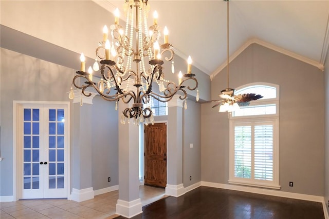 5710 Neustadt Dr, Corpus Christi, TX 78414 - unfurnished room with french doors, high vaulted ceiling, healthy amount of natural light, a chandelier, and ceiling fan