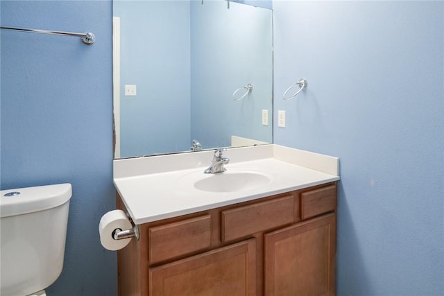 5710 Neustadt Dr, Corpus Christi, TX 78414 - half bath featuring vanity and toilet