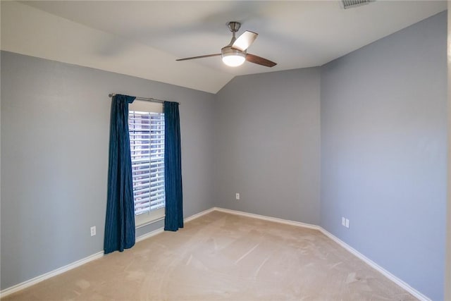 5710 Neustadt Dr, Corpus Christi, TX 78414 - empty room featuring a ceiling fan, light carpet, baseboards, and lofted ceiling