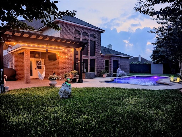 5710 Neustadt Dr, Corpus Christi, TX 78414 - back of house with brick siding and a patio