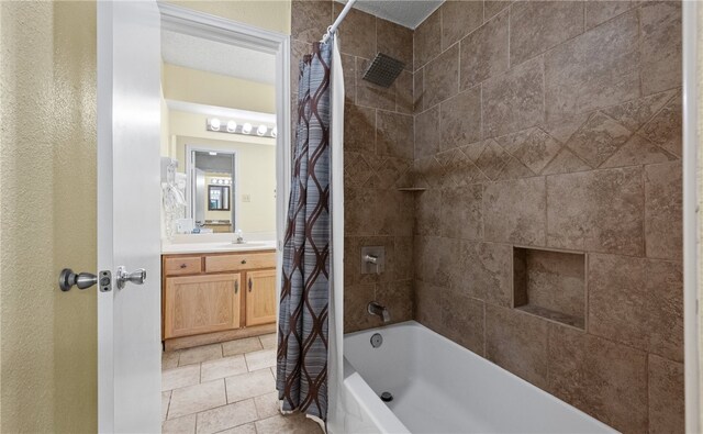 bathroom featuring vanity, tile patterned floors, and shower / bathtub combination with curtain