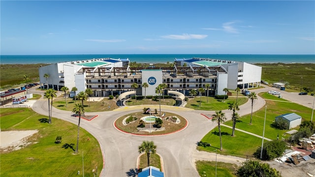 birds eye view of property with a water view