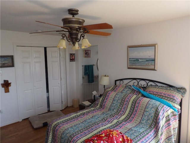 170 Barker Rd, Bayside, TX 78340 - bedroom featuring wood finished floors, a closet, and a ceiling fan