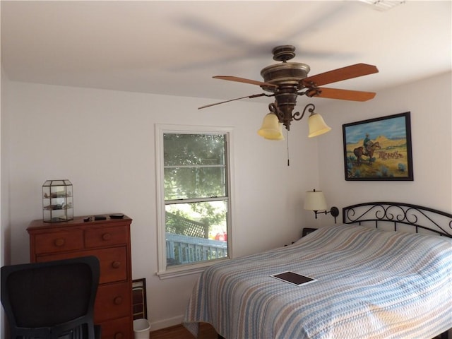 170 Barker Rd, Bayside, TX 78340 - bedroom featuring a ceiling fan and wood finished floors