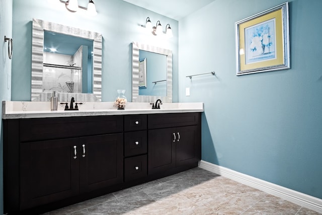 bathroom featuring walk in shower and vanity