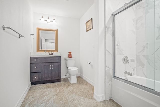 full bathroom featuring enclosed tub / shower combo, toilet, and vanity