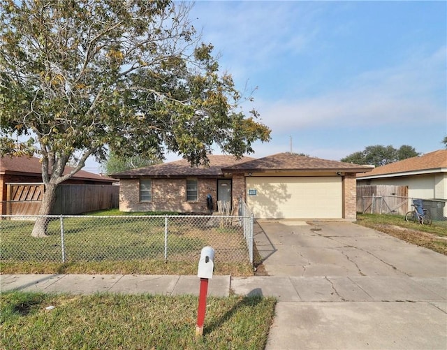 ranch-style house with a garage and a front yard