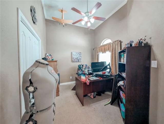 office with ceiling fan, ornamental molding, and light carpet