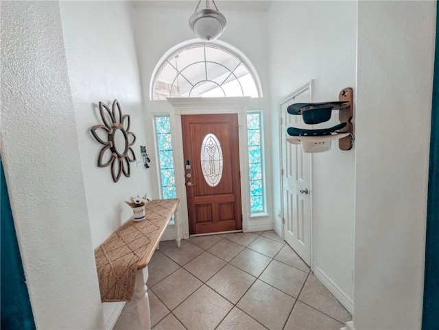 entrance foyer featuring light tile patterned floors