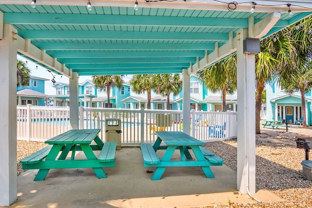 view of patio featuring a swimming pool