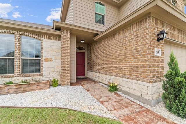 1035 Santa Catalina St, Portland, TX 78374 - doorway to property featuring brick siding and a garage