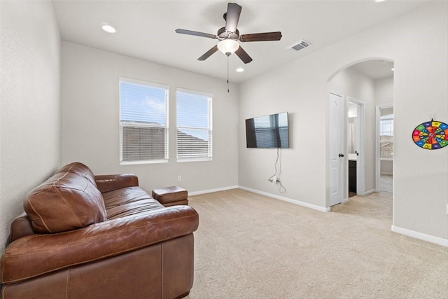 1035 Santa Catalina St, Portland, TX 78374 - living area with arched walkways, a ceiling fan, light carpet, baseboards, and recessed lighting