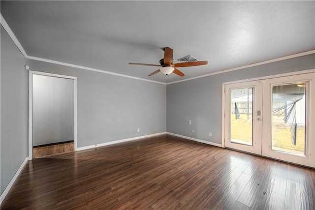 empty room with dark wood-type flooring, ceiling fan, crown molding, and french doors