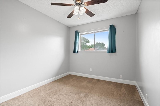 1729 Mermaid Dr, Corpus Christi, TX 78412 - spare room featuring a textured ceiling, carpet flooring, a ceiling fan, and baseboards