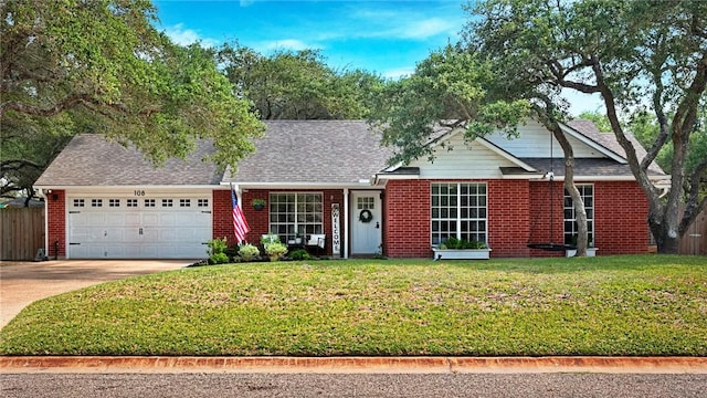 ranch-style home with an attached garage, brick siding, a front yard, and concrete driveway